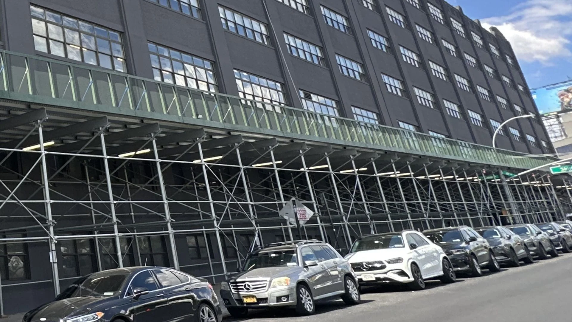 NYC sidewalk shed structure supporting facade restoration work