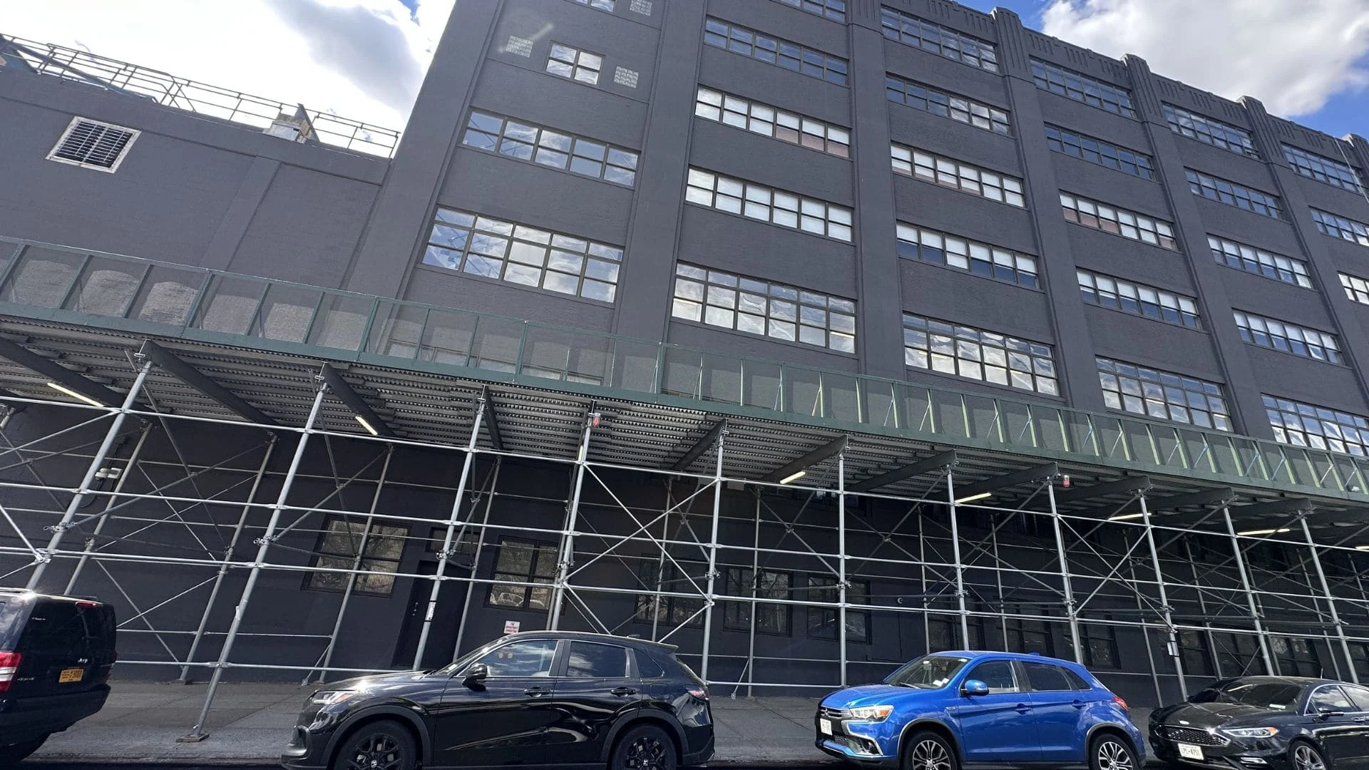 DOB-compliant scaffolding and sidewalk shed structure in NYC