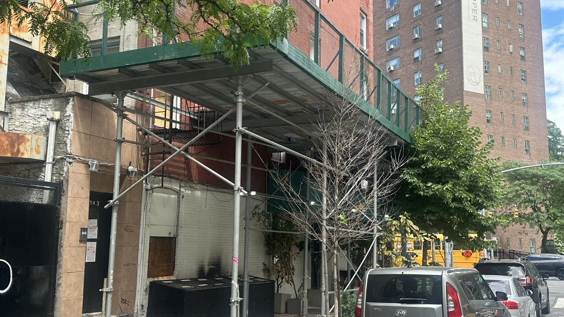 NYC sidewalk shed structure supporting facade restoration work