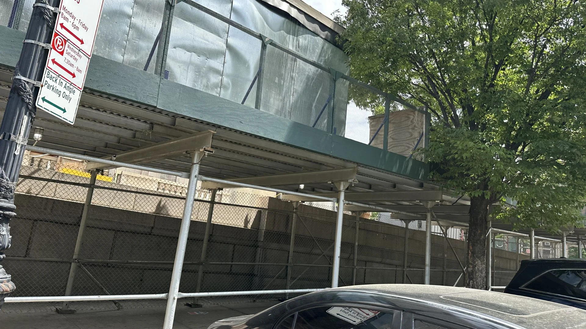 DOB-compliant scaffolding and sidewalk shed structure in NYC